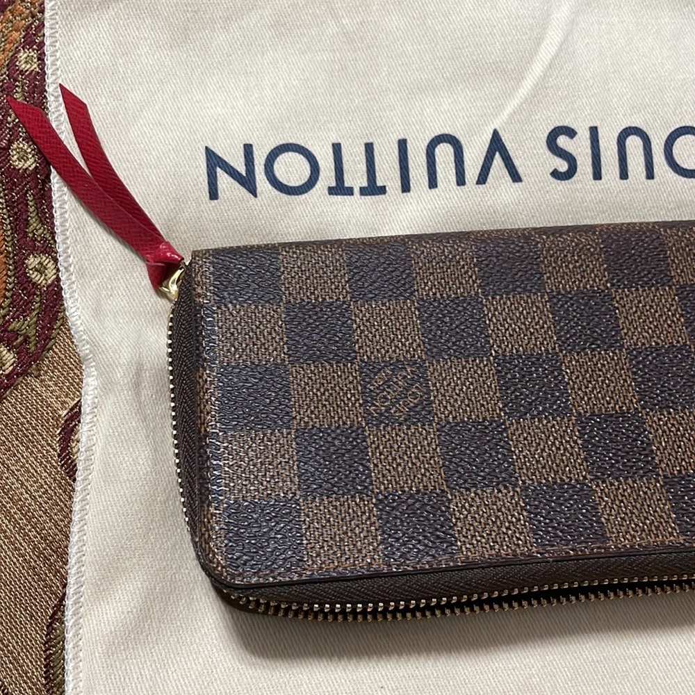Louis Vuitton Damier wallet.